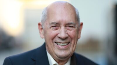 Bill Rasmussen smiling