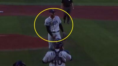 Bryan Baker grabbing his crotch