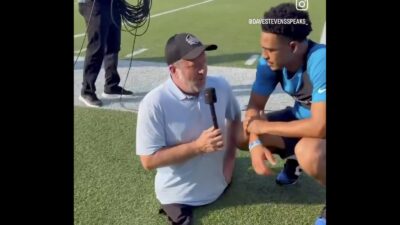 Panthers QB Bryce Young being interviewed by legless reporter Dave Stevens