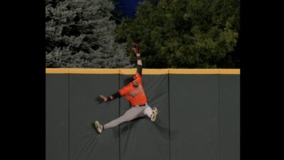 Orioles' Colton Cowser making a home run robbery with a catch on a fly ball off the bat of Rockies' Jake McCarthy