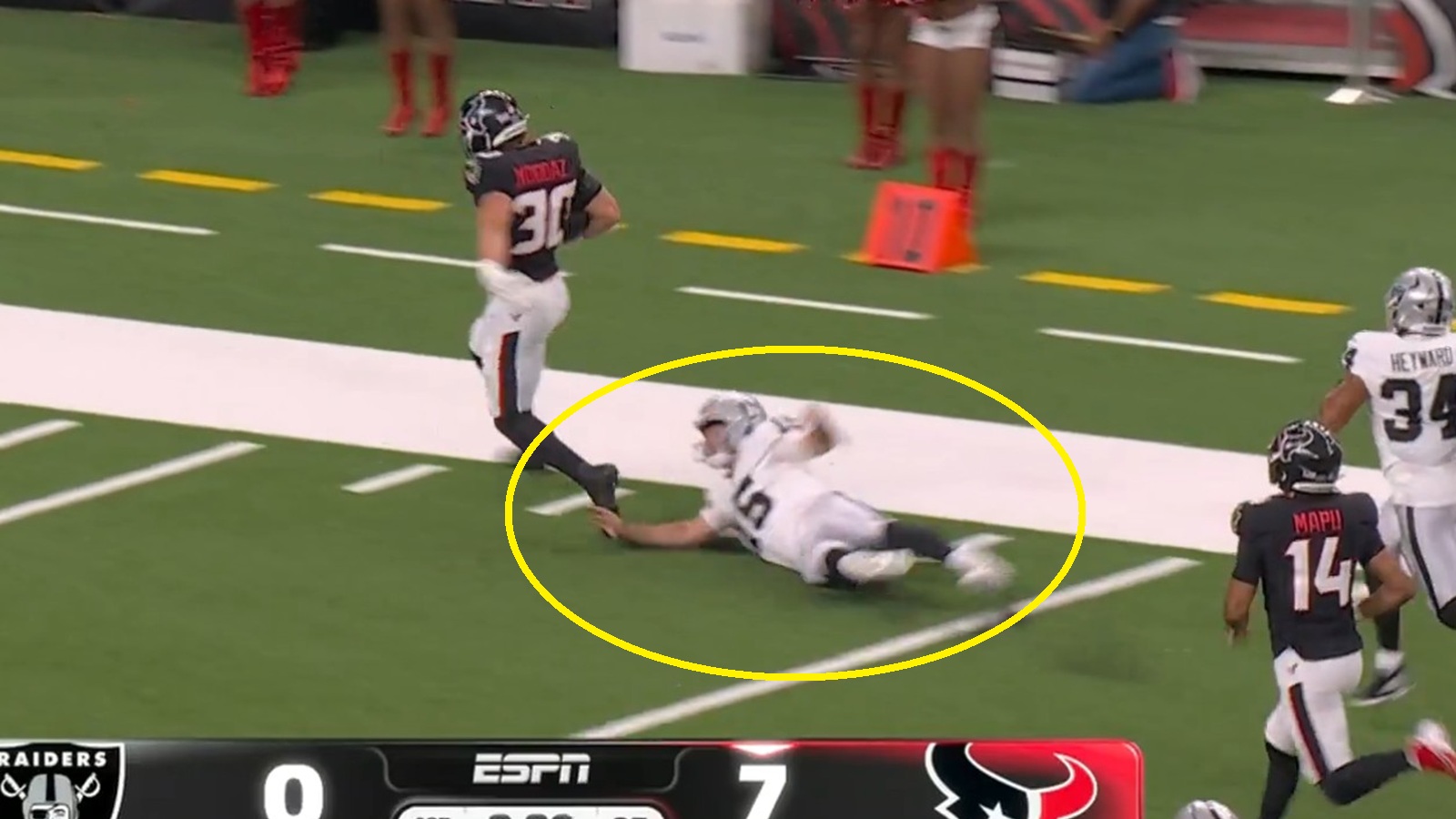 Fernando Mendoza trying to make a tackle