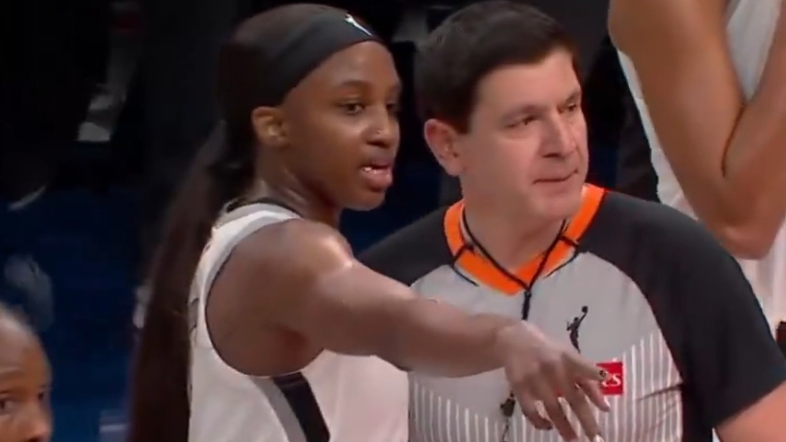 Jackie Young pointing out a fan