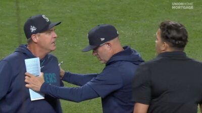 Mariners manager Dan Wilson getting ejected after arguing with home plate umpire Emil Jimenez about disallowing a Julio Rodriguez ABS challenge request