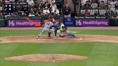 Mets pitcher Jefry Yan prematurely celebrates by jumping into the air during game against White Sox