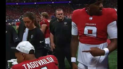 Michael Penix pointing at Tua Tagovailoa