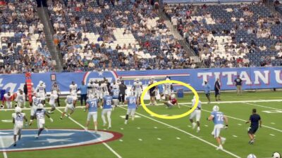Will Levis slipping during a Titans scrimmage