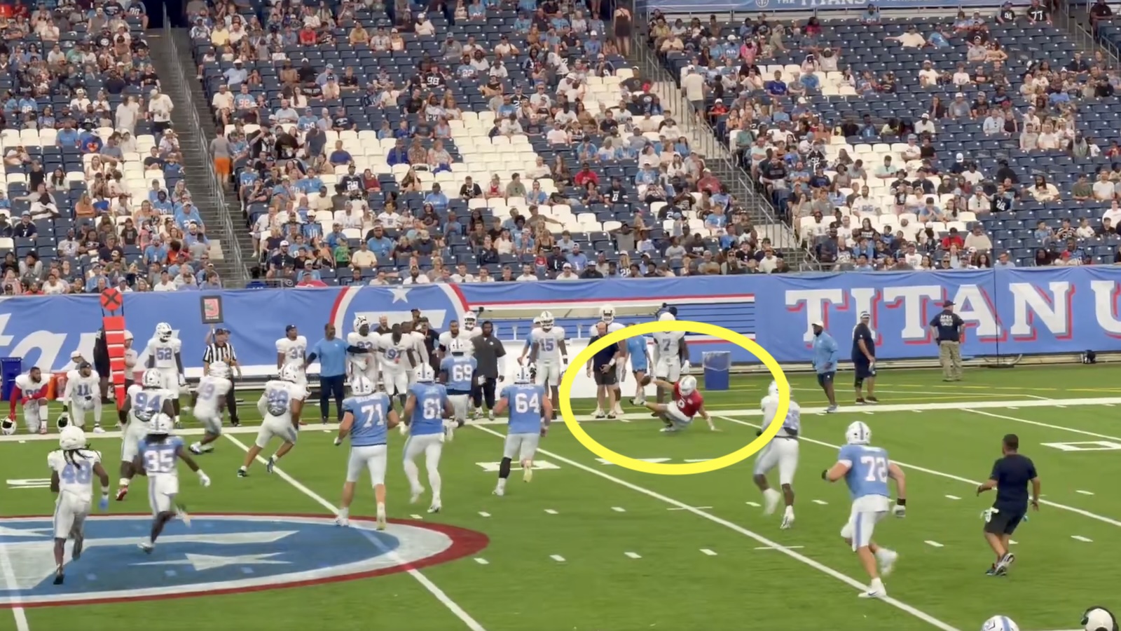Will Levis slipping during a Titans scrimmage