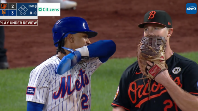 Francisco Lindor interacting with Pete Alonso