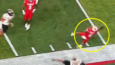 Kansas QB Isaiah Marshall with a wild spin pass.