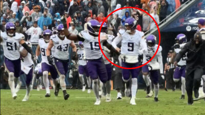 JJ McCarthy celebrating with Vikings teammates
