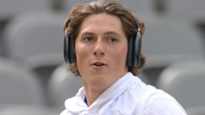 Mason Heintschel (6) warming up