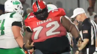 OBrendan "Big Baby" Jones celebrated after a tackle.