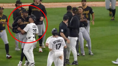 Oneil Cruz behing held back