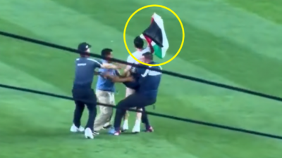 September 11 protestor storms field during Yankees-Mets game.