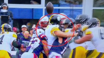 Aaron Rodgers taking a hit