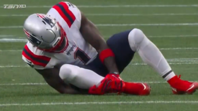 AJ Brown holding his ankle