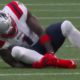 AJ Brown holding his ankle