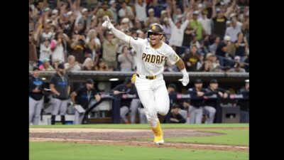 Ethan Salas celebrating after hitting a walk-off RBI single for the Padres