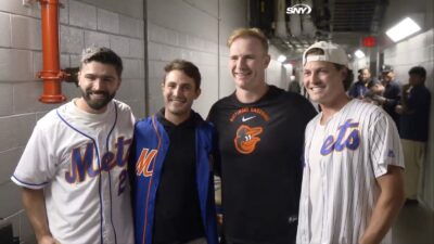 Pete Alonso taking a photo with the Mets fans who returned his 300th home run ball