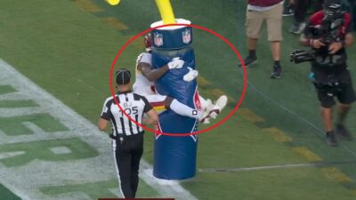 Stefon Diggs jumping on the goalposts