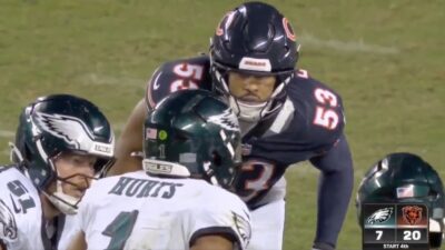 Bears LB TJ Edwards listening in on Jalen Hurts during Eagles huddle.