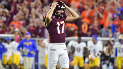 Virginia Tech kicker John Love reacts to controversial miss.