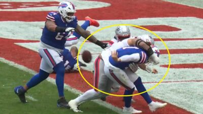 Josh Allen throwing a behind-the-back pass