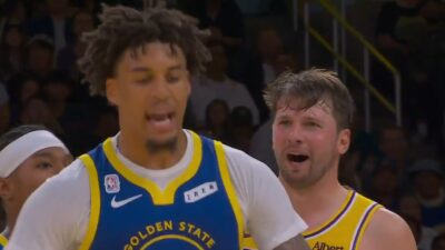 Luka Doncic talking to Yaxel Lendeborg