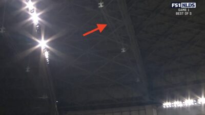 Padres batter Ty France's fly ball hitting the roof in Game 1 of the NLDS against the Brewers