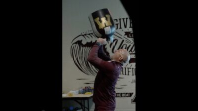 Minnesota coach PJ Fleck drinking from the Little Brown Jug after beating Michigan