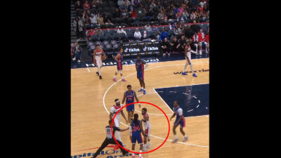 Trae Young in a confrontation on the court