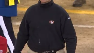 Jim Harbaugh layers fat