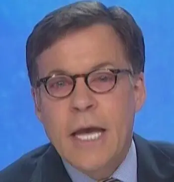 Bob Costas pink eye glasses