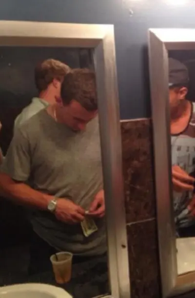 Johnny Manziel rolling bill bathroom money