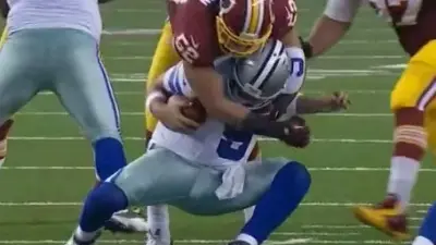 Tony Romo sack back
