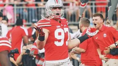 Joey Bosa sack shrug emoji