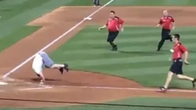 Cardinals fan somersault