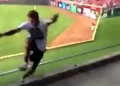 Reds fan streaker