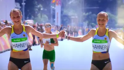 Hahner twins hold hands