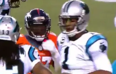Cam Newton TJ Ward