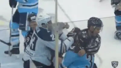 KHL referee punched