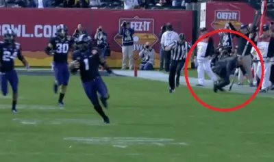 TCU suit sideline
