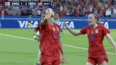 Alex Morgan sipping tea