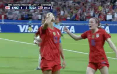 Alex Morgan sipping tea