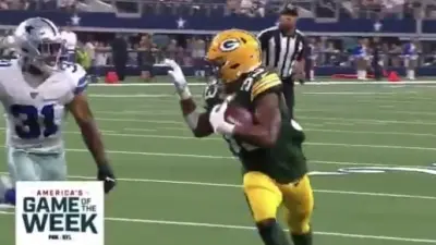 Aaron Jones Byron Jones wave