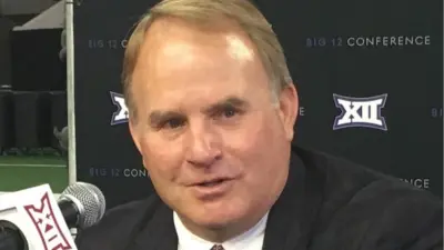 Gary Patterson at a press conference