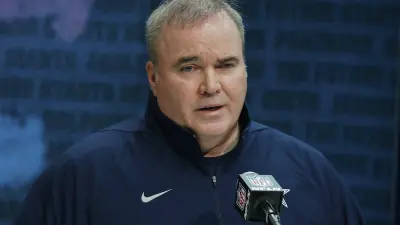 Mike McCarthy at the podium