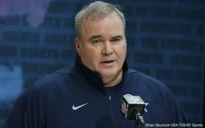Mike McCarthy at the podium