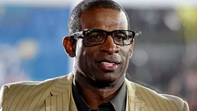 Deion Sanders in a suit