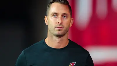 Kliff Kingsbury in a Cardinals shirt